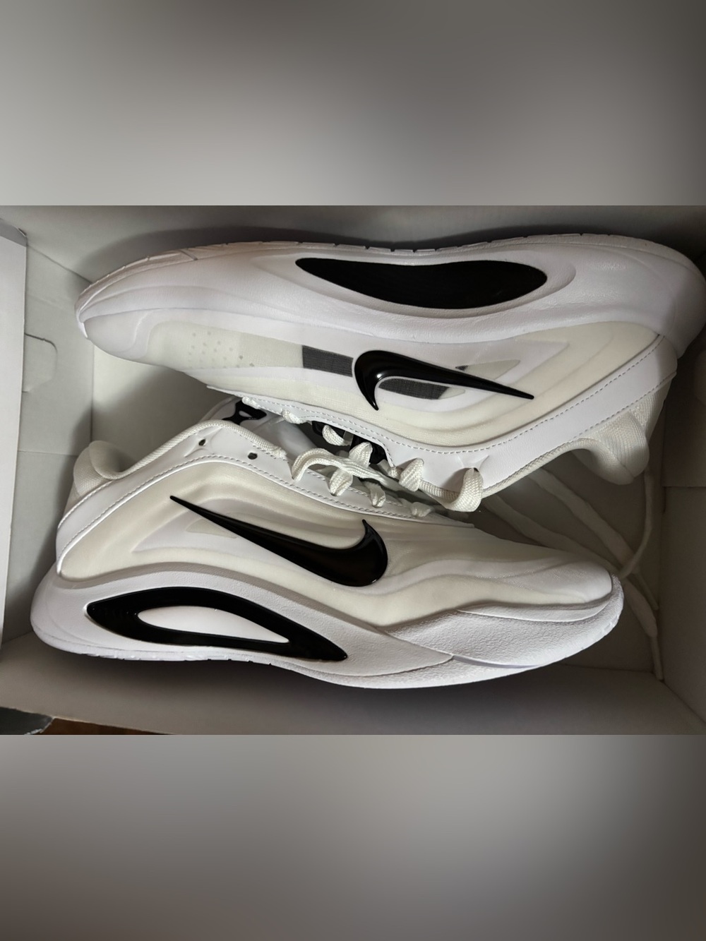 Nike Women’s White Sneakers with Black Swoosh